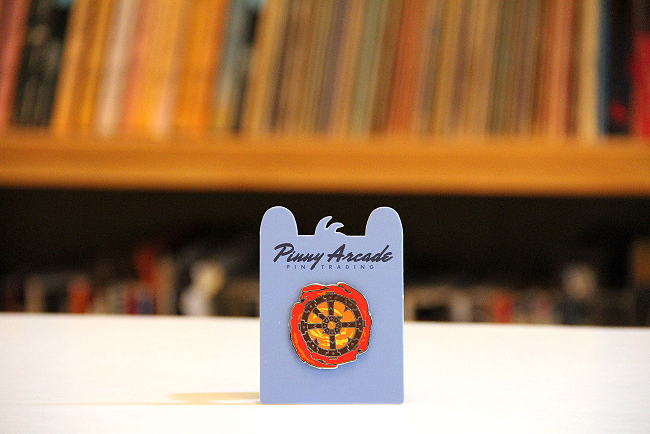 Burning Wheel Pinny Arcade Enamel Pin